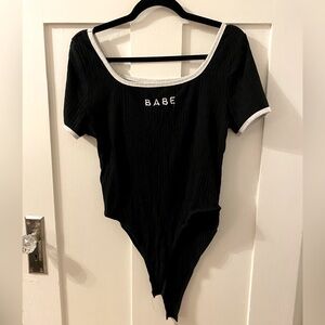 SHEIN Black Body with monogram in the chest area. Size 1XL